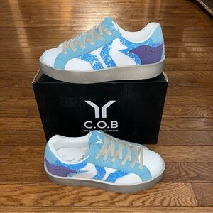 C.O.B. By Culture Of Brave Leather & Glitter Wing Play Sneaker Blue Women’s 10